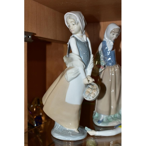 336 - THREE NAO (LLADRO) FIGURES, comprising 'Graceful' 0237, girl with basket of fruit, height 24cm, girl... 