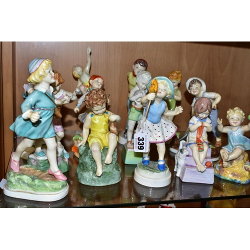 339 - FOURTEEN ROYAL WORCESTER CHILD'S BLESSING BOY AND GIRL DAYS OF THE WEEK FIGURES, comprising Monday 3... 