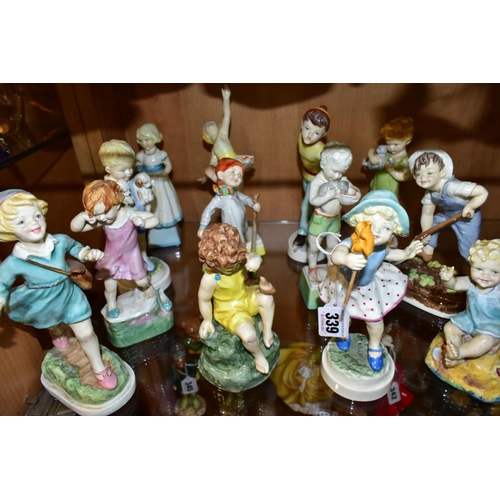 339 - FOURTEEN ROYAL WORCESTER CHILD'S BLESSING BOY AND GIRL DAYS OF THE WEEK FIGURES, comprising Monday 3... 