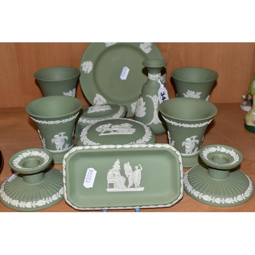 348 - ELEVEN PIECES OF WEDGWOOD GREEN JASPERWARE, including a pair of dwarf candlesticks, two pairs of con... 