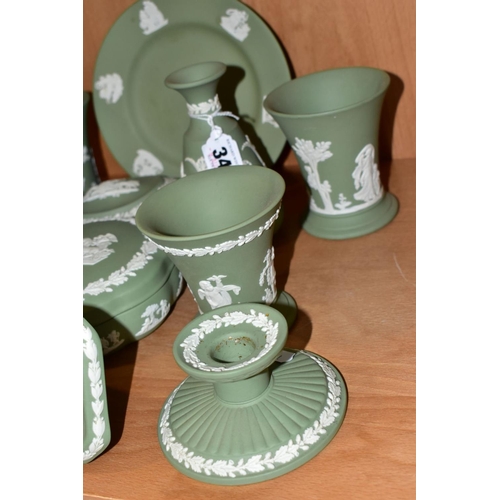 348 - ELEVEN PIECES OF WEDGWOOD GREEN JASPERWARE, including a pair of dwarf candlesticks, two pairs of con... 