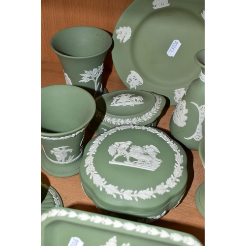 348 - ELEVEN PIECES OF WEDGWOOD GREEN JASPERWARE, including a pair of dwarf candlesticks, two pairs of con... 