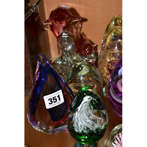 351 - A GROUP OF SEVENTEEN MODERN GLASS PAPERWEIGHTS AND ORNAMENTS, mostly unbranded and of conical shape ... 