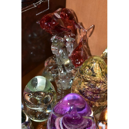 351 - A GROUP OF SEVENTEEN MODERN GLASS PAPERWEIGHTS AND ORNAMENTS, mostly unbranded and of conical shape ... 