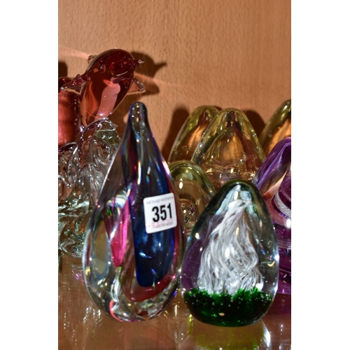 351 - A GROUP OF SEVENTEEN MODERN GLASS PAPERWEIGHTS AND ORNAMENTS, mostly unbranded and of conical shape ... 