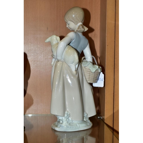 353 - TWO LLADRO FIGURES, comprising no 4835 'Girl with Lamb', designed by Juan Huerta, issued 1972-1991, ... 