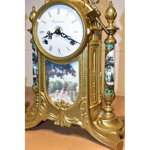 358 - A MODERN ITALIAN BRASS AND PORCELAIN 'IMPERIAL' CLOCK GARNITURE, the white enamel dial with Roman nu... 