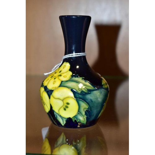 362 - A SMALL MOORCROFT POTTERY BUD VASE, Buttercup pattern, impressed and painted backstamp, height 10.5c... 