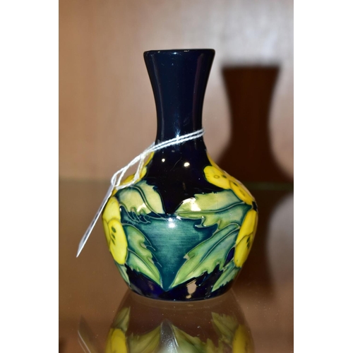 362 - A SMALL MOORCROFT POTTERY BUD VASE, Buttercup pattern, impressed and painted backstamp, height 10.5c... 