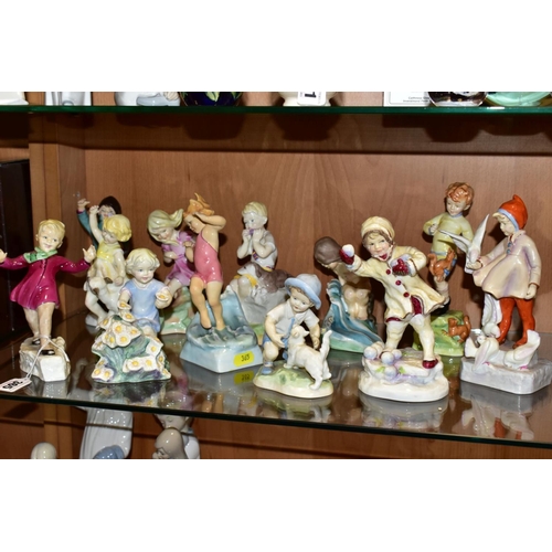 365 - A SET OF TWELVE ROYAL WORCESTER MONTHS OF THE YEAR FIGURES MODELLED BY FREDA DOUGHTY, comprising 'Ja... 