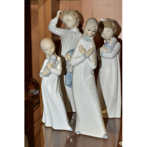 368 - SIX SPANISH PORCELAIN FIGURES INCLUDING TWO NAO FIGURES OF CHILDREN IN NIGHTDRESSES, one holding a d... 