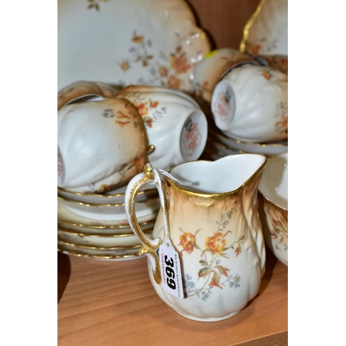 369 - AN EARLY 20TH CENTURY M. REDON LIMOGES PORCELAIN TEA SET, blush ivory ground printed with floral spr... 