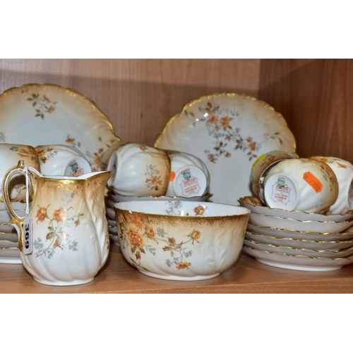 369 - AN EARLY 20TH CENTURY M. REDON LIMOGES PORCELAIN TEA SET, blush ivory ground printed with floral spr... 