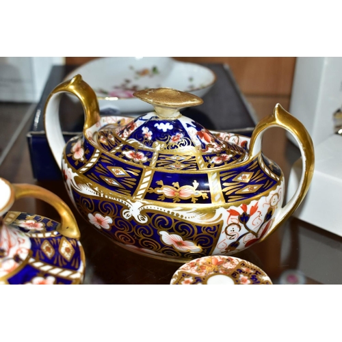 379 - A SMALL GROUP OF ROYAL CROWN DERBY, comprising three Imari pattern items, all with restoration or da... 