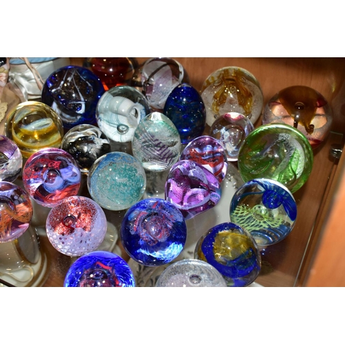 381 - TWENTY FIVE CAITHNESS GLASS PAPERWEIGHTS, including 'Inner Circle', 'Nemesis', 154/750, 'Ribbons', '... 