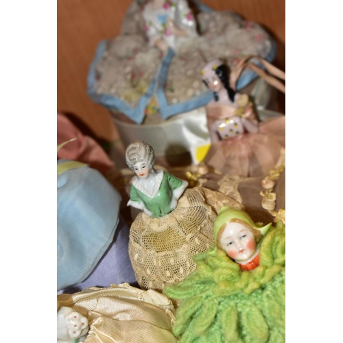 382 - A COLLECTION OF SIXTEEN LATE/EARLY 20TH CENTURY PORCELAIN HALF-DOLLS, including two dressing table b... 