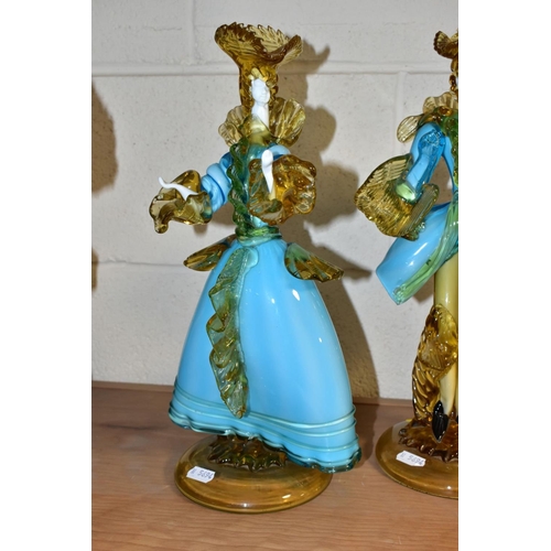 385 - A PAIR OF  BLUE AND YELLOW GLASS FIGURES OF A LADY AND GENTLEMAN in the style of the Venetian Glass ... 