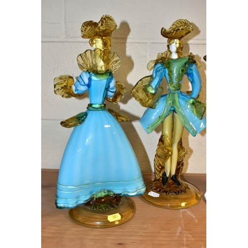 385 - A PAIR OF  BLUE AND YELLOW GLASS FIGURES OF A LADY AND GENTLEMAN in the style of the Venetian Glass ... 