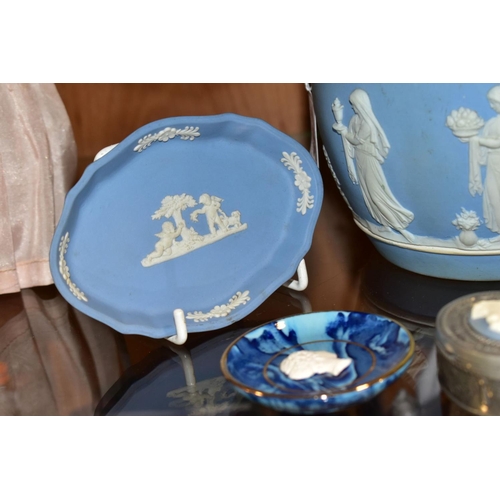 387 - THREE WEDGWOOD PALE BLUE JASPERWARE ITEMS, comprising a biscuit barrel with a plated rim, handle and... 