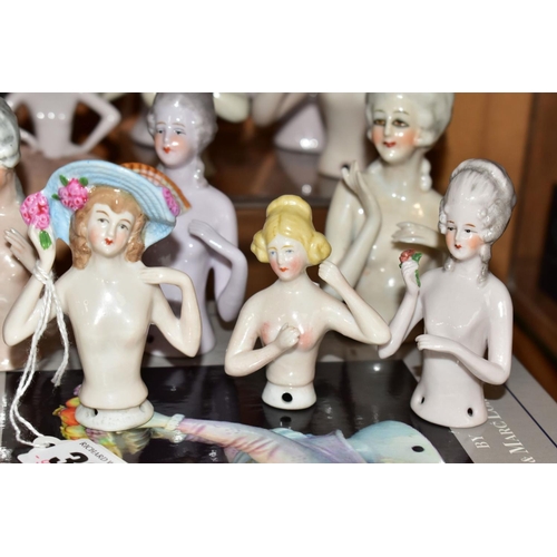 389 - A COLLECTION OF FOURTEEN LATE 19TH/EARLY 20TH CENTURY PORCELAIN NUDE HALF-DOLLS, in a variety of pos... 