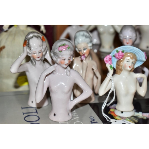 389 - A COLLECTION OF FOURTEEN LATE 19TH/EARLY 20TH CENTURY PORCELAIN NUDE HALF-DOLLS, in a variety of pos... 