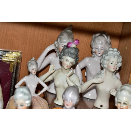 389 - A COLLECTION OF FOURTEEN LATE 19TH/EARLY 20TH CENTURY PORCELAIN NUDE HALF-DOLLS, in a variety of pos... 