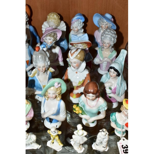 391 - SEVENTEEN LATE/EARLY 20TH CENTURY PORCELAIN HALF-DOLLS, together with five other ceramic miniature f... 