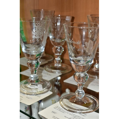 392 - A SET OF TWELVE BOXED LIMITED EDITION CAITHNESS ENGRAVED GLASS GOBLETS, from the  series of Twelve D... 