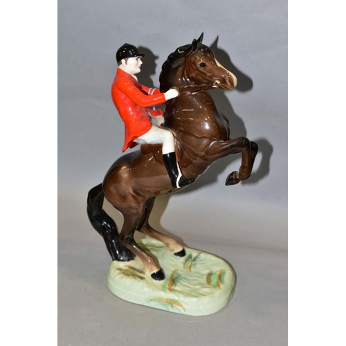 398 - A BESWICK HUNTSMAN (ON REARING HORSE), No 868, style one, second version, brown, Beswick crest backs... 