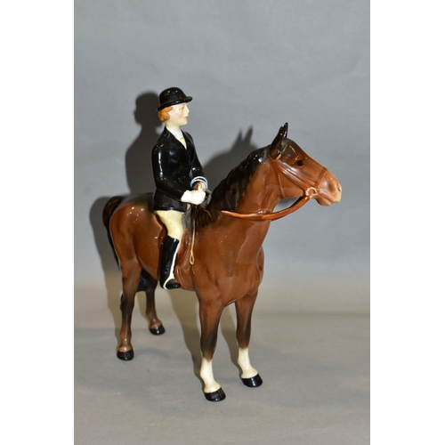 399 - A BESWICK HUNTSWOMAN, No 1730, style two, brown horse, Beswick crest backstamp, height 21.5cm (Condi... 