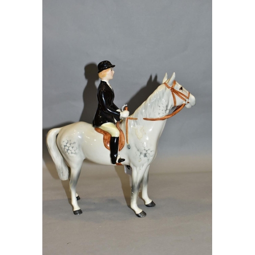 401 - A BESWICK HUNTSWOMAN, No 1730, style two, grey horse, Beswick crest backstamp, height 21.5cm (Condit... 