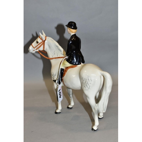 401 - A BESWICK HUNTSWOMAN, No 1730, style two, grey horse, Beswick crest backstamp, height 21.5cm (Condit... 