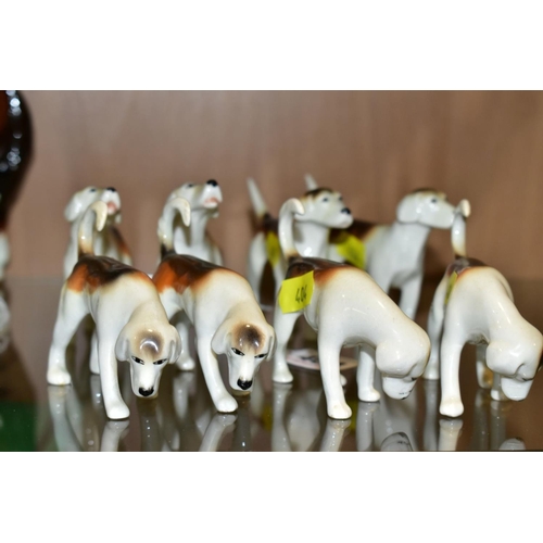 404 - TWO SETS OF FOUR BESWICK FOXHOUNDS, first versions, No 941 (x2), No 942 (x2), No 943 (x2) and No 944... 