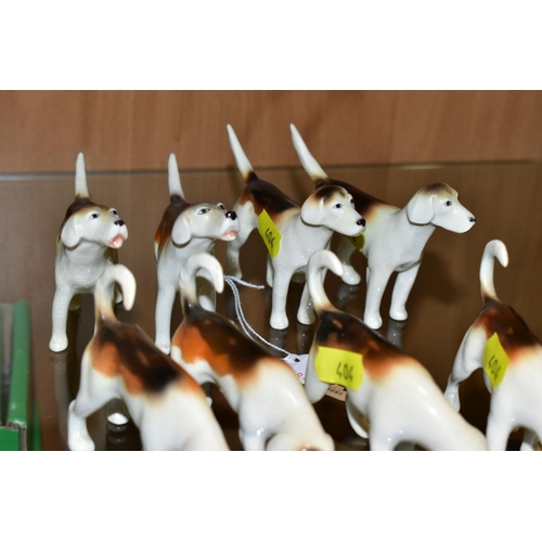 404 - TWO SETS OF FOUR BESWICK FOXHOUNDS, first versions, No 941 (x2), No 942 (x2), No 943 (x2) and No 944... 