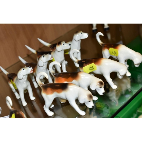 404 - TWO SETS OF FOUR BESWICK FOXHOUNDS, first versions, No 941 (x2), No 942 (x2), No 943 (x2) and No 944... 