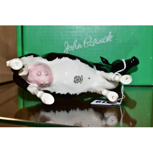 419 - A BOXED BESWICK RARE BREED SHETLAND COW, No 4112 designed b y Robert Donaldson, Beswick crest backst... 