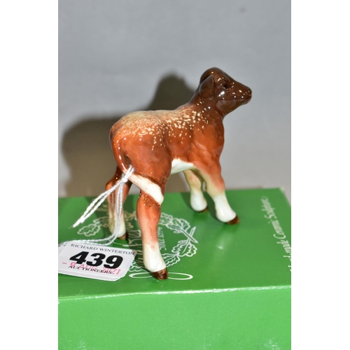 439 - A BESWICK DAIRY SHORTHORN CALF, No.1406C, oval Beswick backstamp, with an odd box (condition: no obv... 