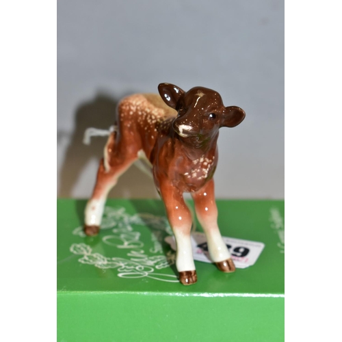 439 - A BESWICK DAIRY SHORTHORN CALF, No.1406C, oval Beswick backstamp, with an odd box (condition: no obv... 