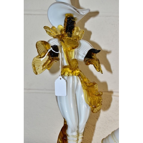 443 - A PAIR OF VENETIAN GLASS COMPANY FIGURES OF A LADY AND GENTLEMAN, white, amber and black, both weari... 