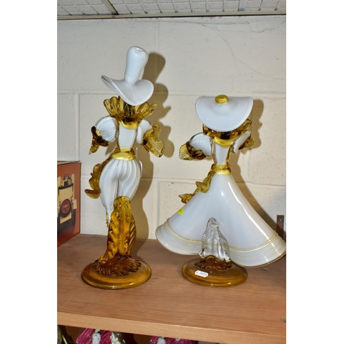 443 - A PAIR OF VENETIAN GLASS COMPANY FIGURES OF A LADY AND GENTLEMAN, white, amber and black, both weari... 