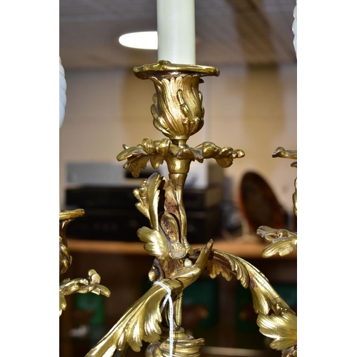 465 - A GILT METAL TABLE LAMP IN THE FORM OF A THREE LIGHT CANDELABRA, height approximately 45cm excluding... 