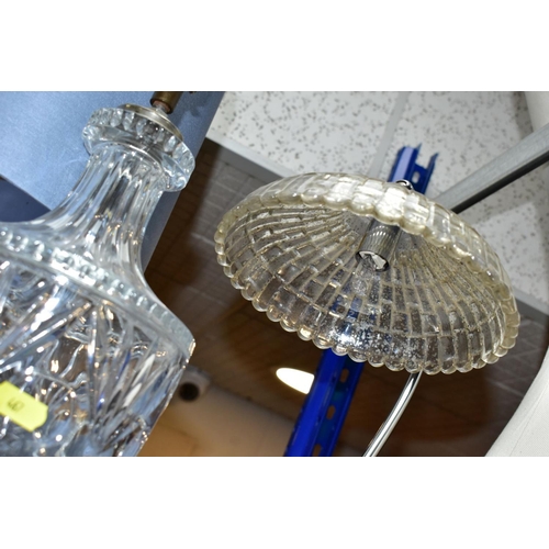 467 - THREE ELECTRIC LAMPS, comprising a cut glass urn shaped table lamp with blue shade, height approxima... 