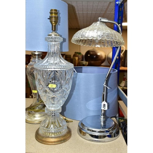 467 - THREE ELECTRIC LAMPS, comprising a cut glass urn shaped table lamp with blue shade, height approxima... 