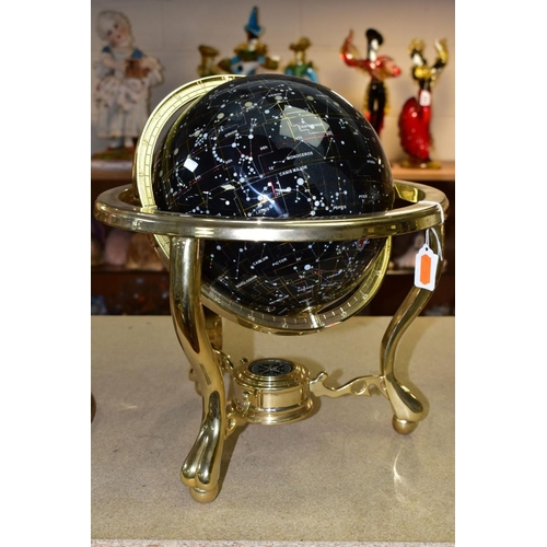 478 - A BOXED GUILDFORD ASTRONOMICAL SOCIETY CELESTIAL GLOBE, supported by a brass metal stand inset with ... 