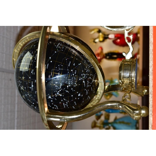 478 - A BOXED GUILDFORD ASTRONOMICAL SOCIETY CELESTIAL GLOBE, supported by a brass metal stand inset with ... 