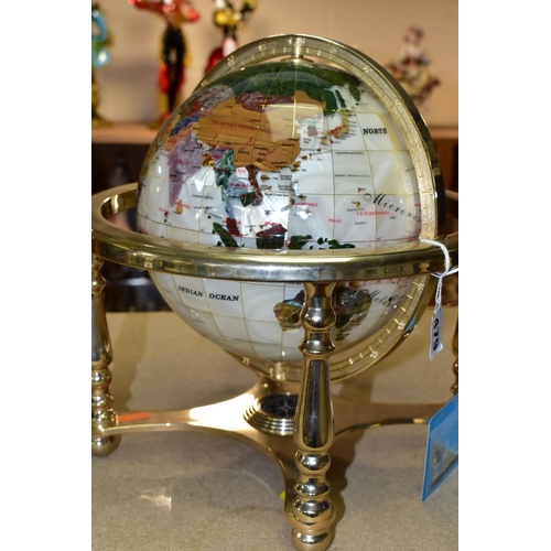 479 - A BOXED SPLENDOR ELEGANCE GEM STONE GLOBE, the terrestrial globe is inset with over thirty different... 