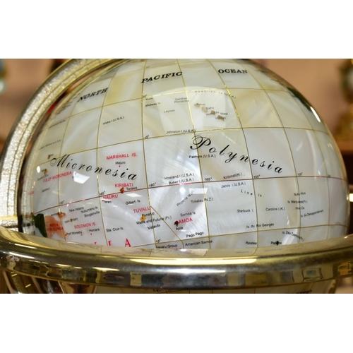 479 - A BOXED SPLENDOR ELEGANCE GEM STONE GLOBE, the terrestrial globe is inset with over thirty different... 