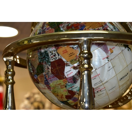 479 - A BOXED SPLENDOR ELEGANCE GEM STONE GLOBE, the terrestrial globe is inset with over thirty different... 