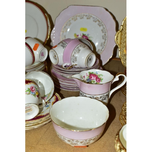 502 - FIVE ASSORTED PART TEA SETS INCLUDING A ROYAL DOULTON CREAM AND GILT PATTERN, No.BB2039/H2908, compr... 