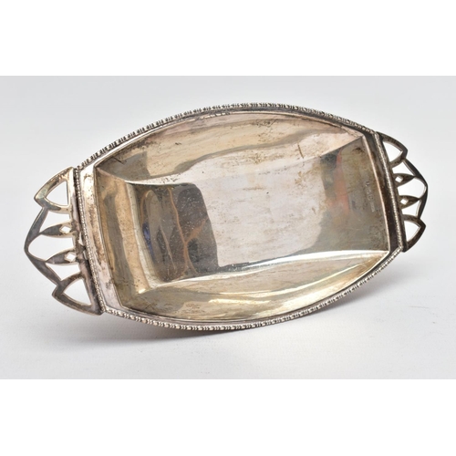 52 - A GEORGE VI SILVER BONBON DISH, oval rectangular form, beaded rim, twin openwork art deco style hand... 